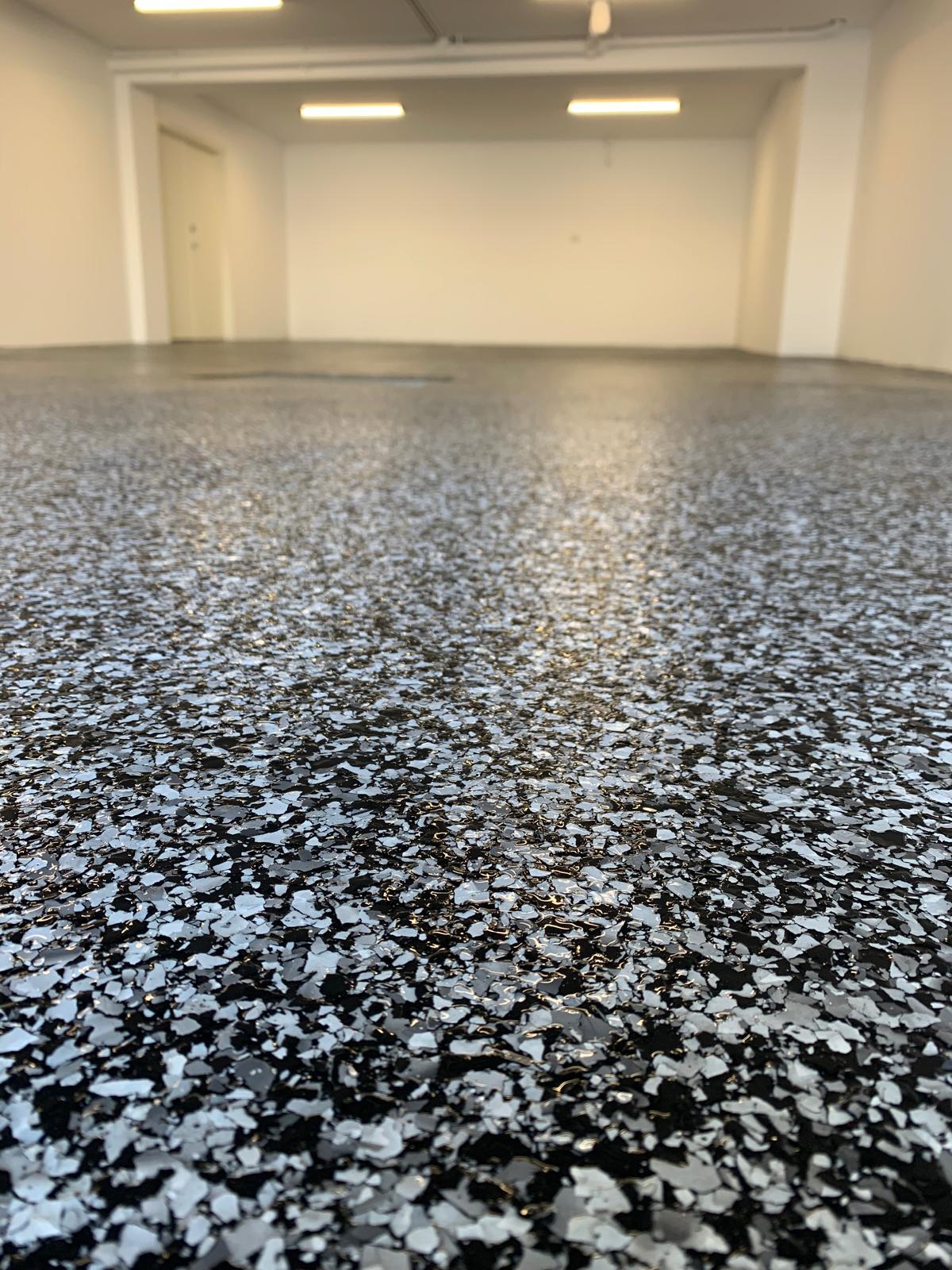 Rockdale garage after ash grey flake epoxy