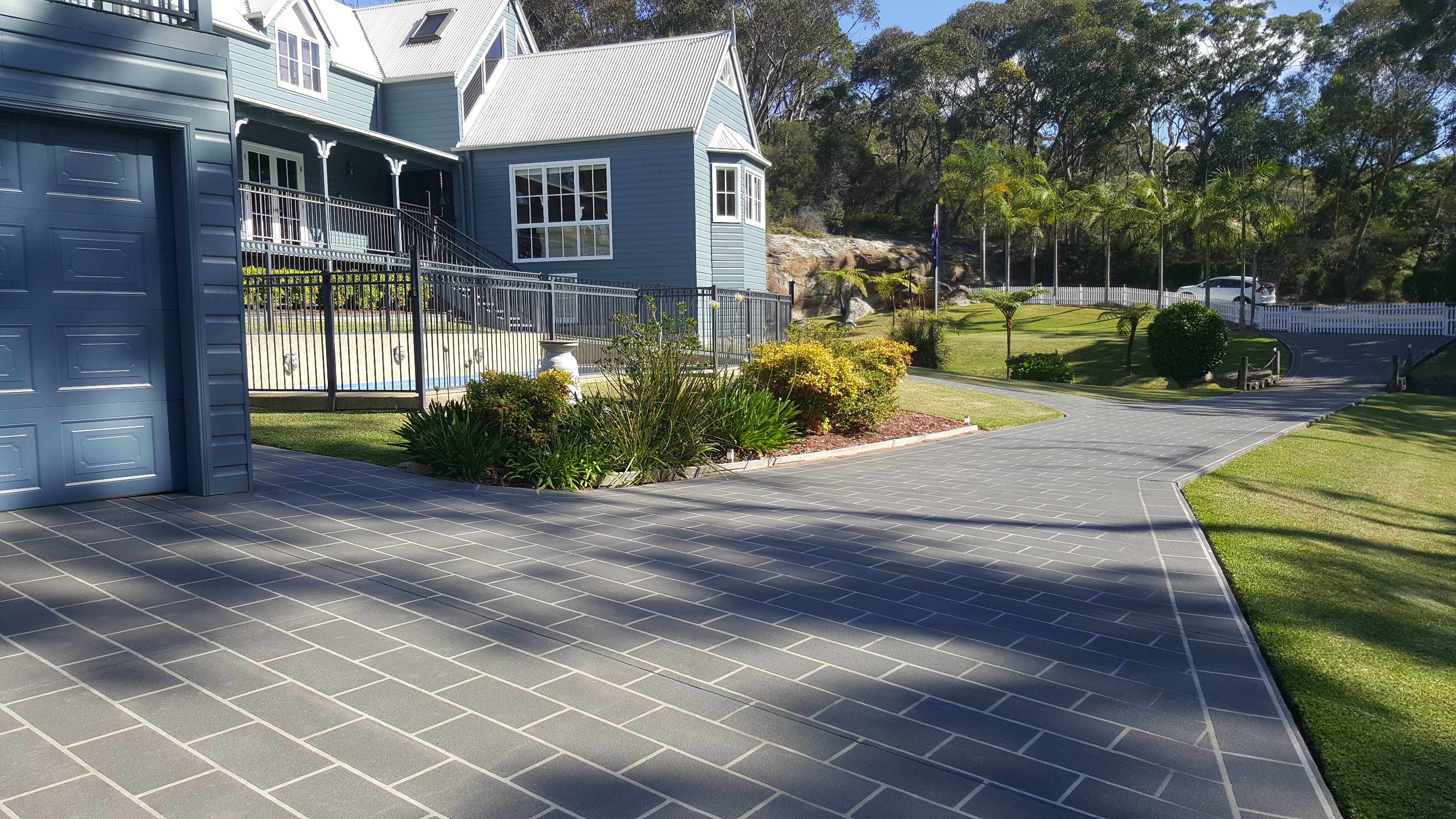 Concrete resurfacing over coloured concrete Terry Hills
