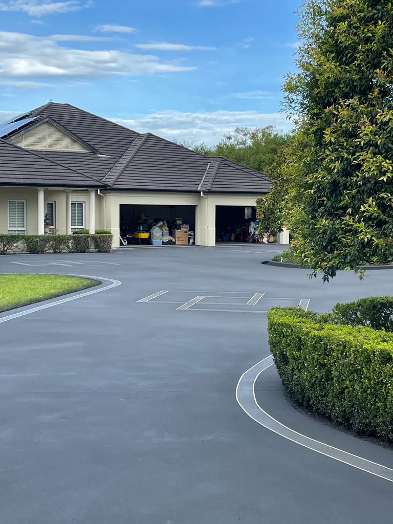Concrete resurfacing over damaged driveway Dural
